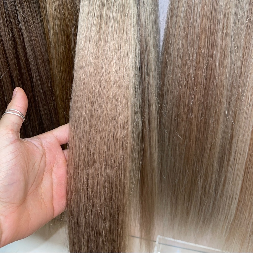 SEAMLESS HAIR EXTENSIONS